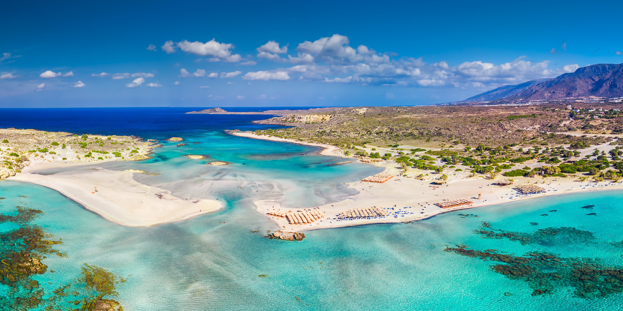 Aerial view of Elafonissi beach on Crete island with azure clear water, Greece, Europe. Crete is the largest and most populous of the Greek islands.